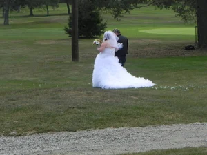 Bride and groom on the golf course