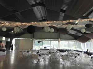 Black and white theme pavilion with string lights and draping